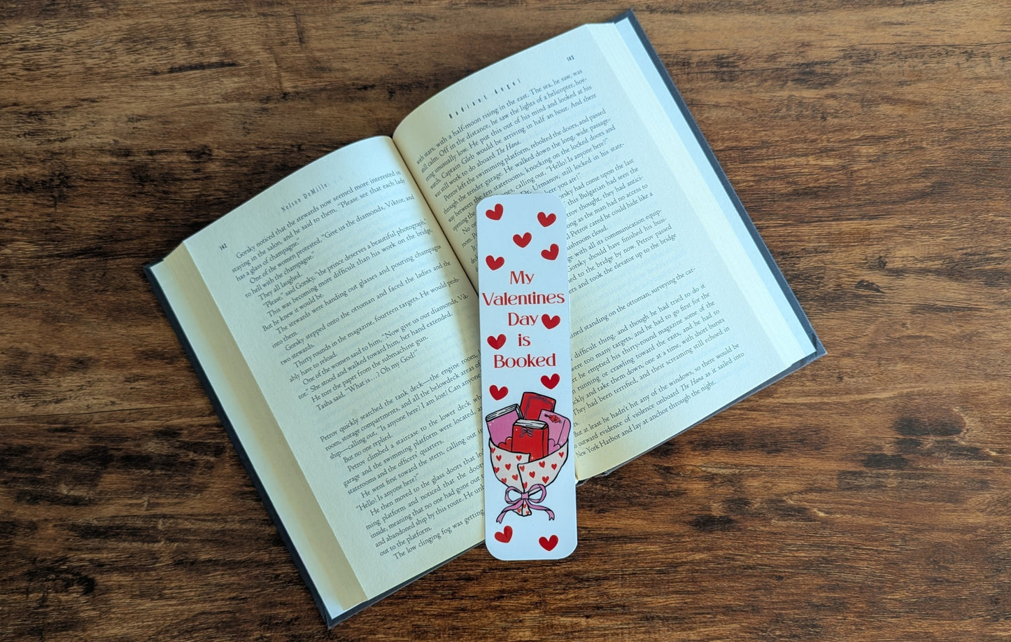White valentine's bookmark with red hearts and a book bouquet